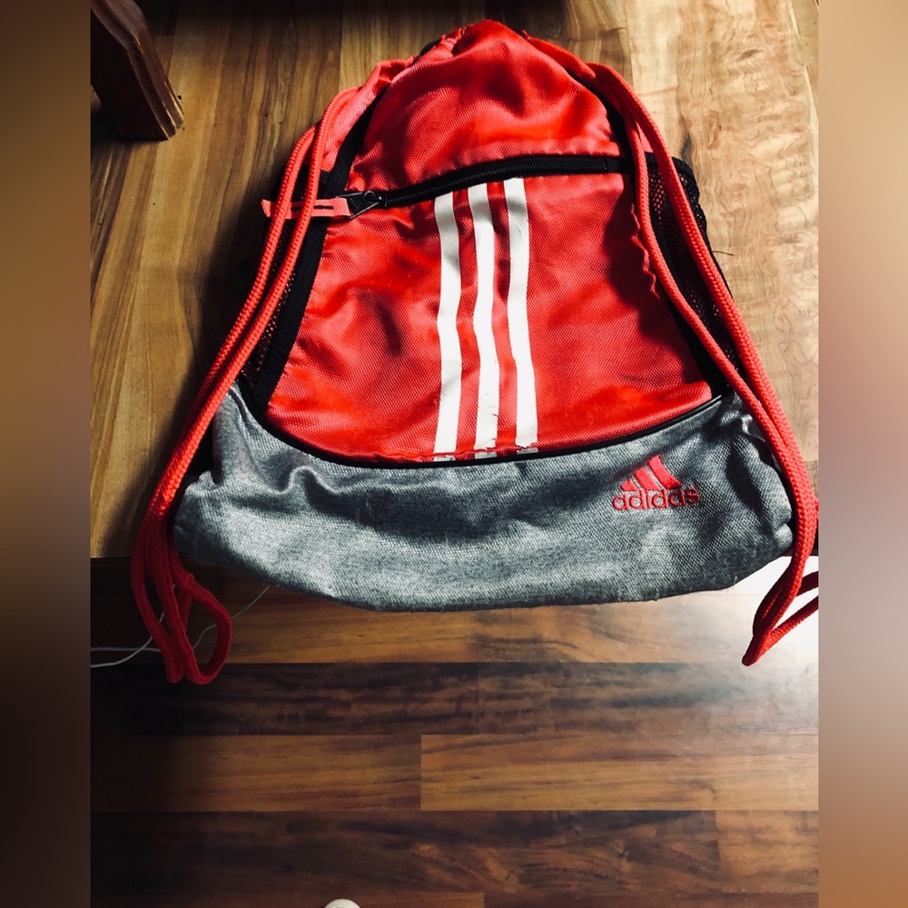 Adidas drawstring gym bag with zipper pocket and side pockets